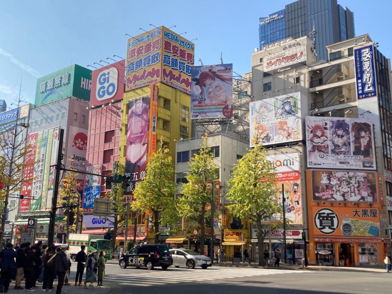 Colorful electronics and anime shop signs in Akihabara