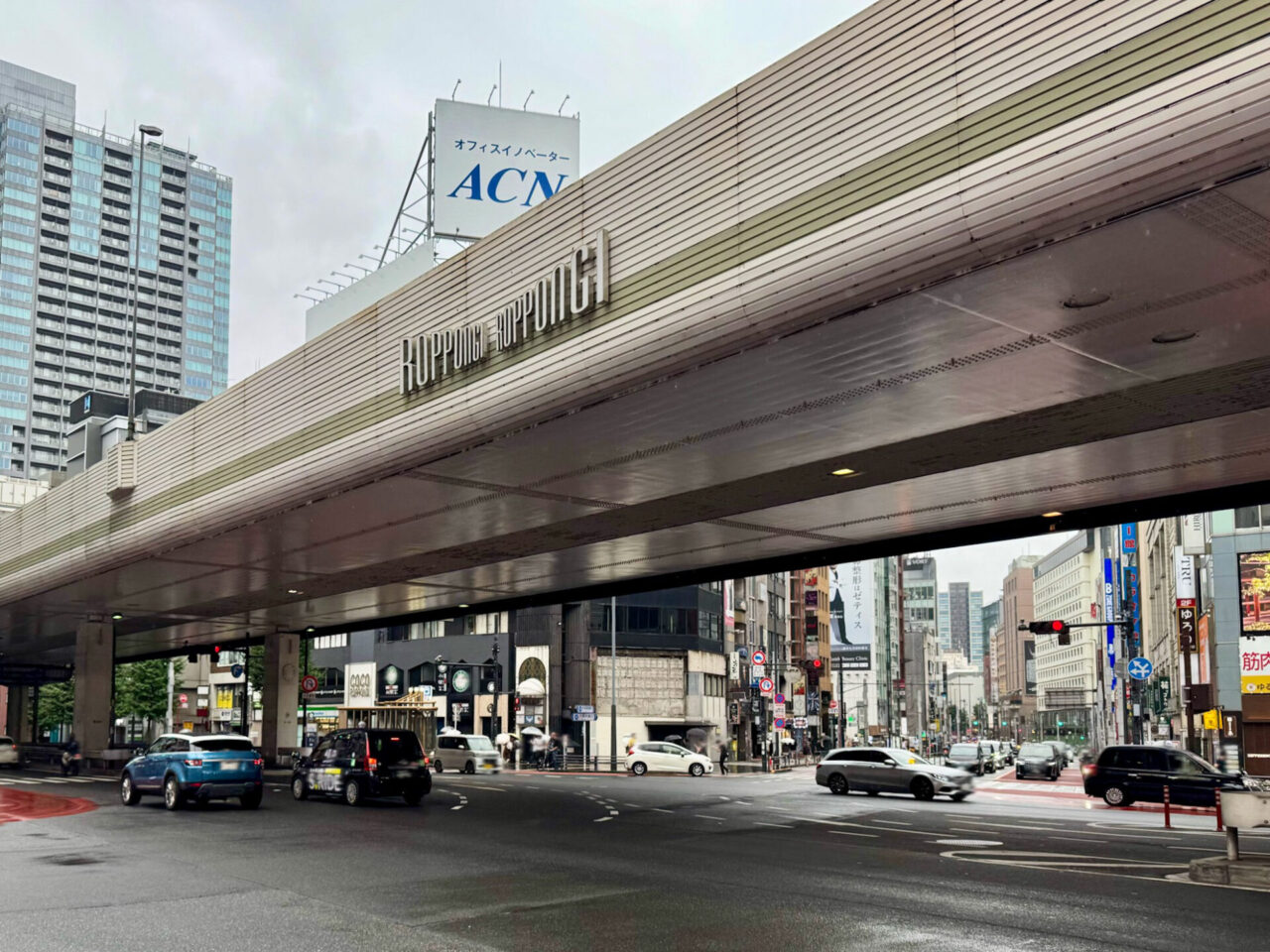 Street view beneath the elevated expressway at Roppongi Crossing