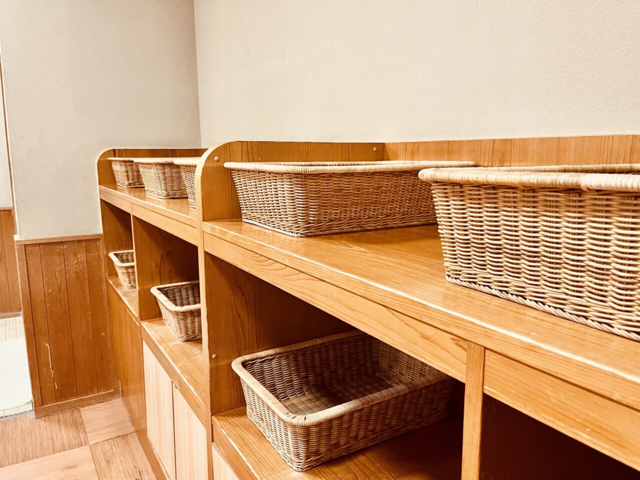 Wicker storage baskets in a Japanese sento changing room