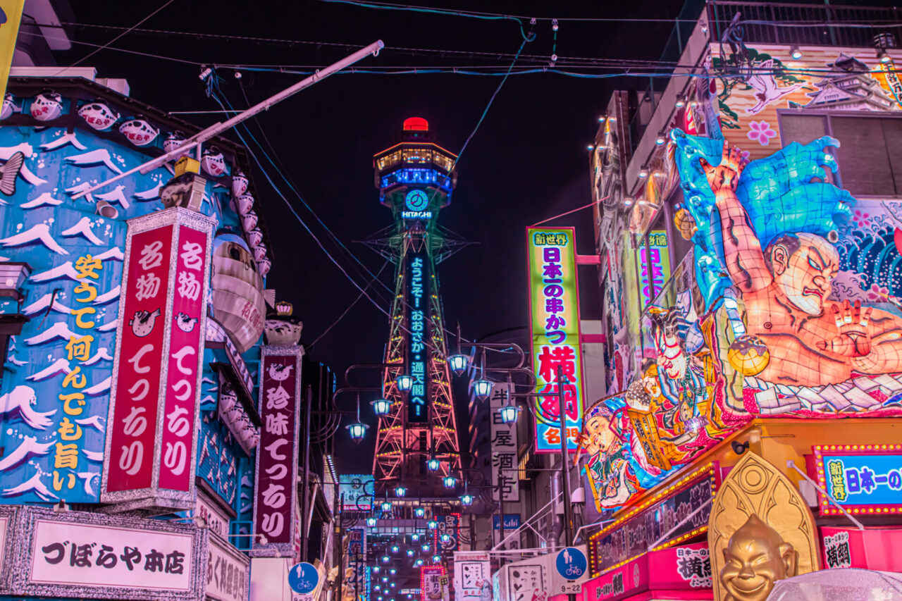 Shinsekai district illuminated at night in Osaka
